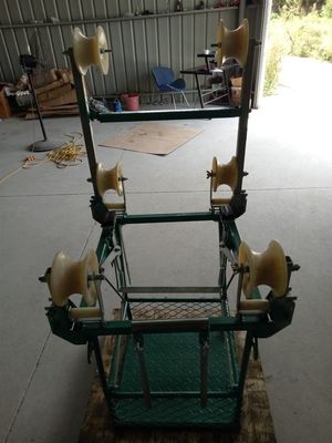 Una linea sopraelevata carrello di quattro conduttori del pacco di ispezione del veicolo di revisione della bicicletta