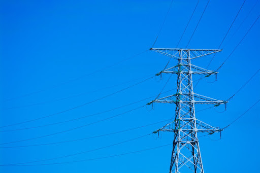 Torre d'acciaio della grata di 33KV 130KV 500KV per il trasporto di energia