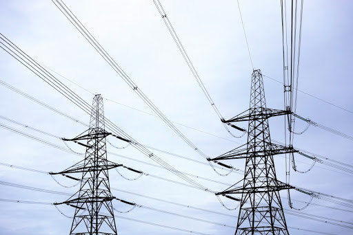 Torre d'acciaio della grata di 33KV 130KV 500KV per il trasporto di energia